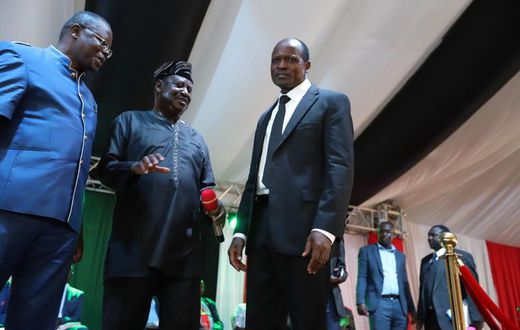 File image of Ochillo Ayacko with Raila Odinga and Okoth Obado
