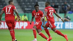 Bayern Munich star Jerome Boateng (L) praised the 'world-class' display of Canadian team-mate Alphonso Davies (C) in the Champions League rout of Barcelona