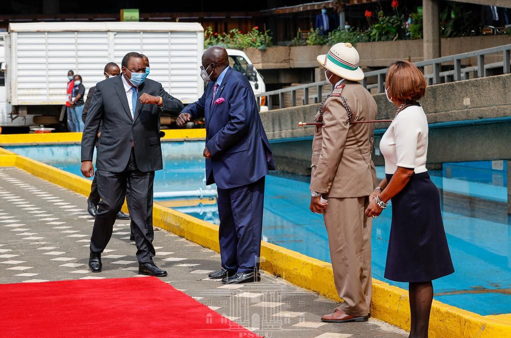 President Uhuru Kenyatta received by Education CS George Magoha at KICC