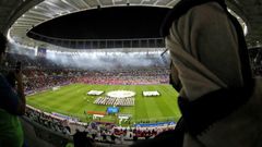 A spectator watches a match at the Ahmad bin Ali stadium in Qatar which will host Club World Cup fixtures