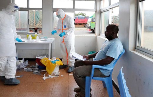 A Kenyan waits to be tested for Covid-19 at a health facility (Photo: Al Jazeera)