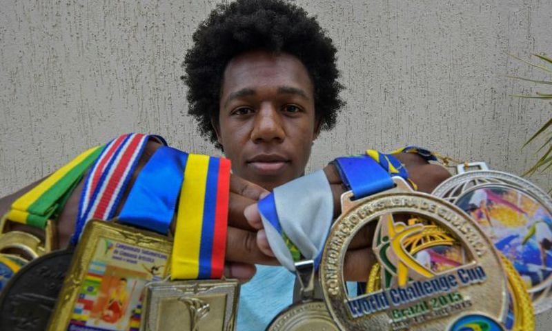 Brazilian gymnast Angelo Assumpcao believes his career was derailed after he spoke out against the racism he was subjected to by his white teammates