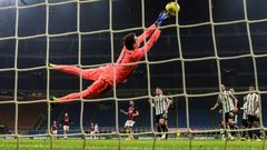 Wojciech Szczesny deflects a shot as Juventus ended AC Milan's unbeaten run stretching back to March.