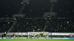 Fans returned to watch Harry Kane and Tottenham shut out Arsenal to stay top of the league