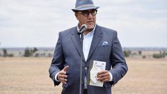 Tourism CS Najib Balala when he received documents to expand Nairobi National Park