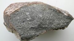A piece of the meteorite Sahara 97096 (about 10 cm long), an enstatite chondrite