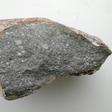 A piece of the meteorite Sahara 97096 (about 10 cm long), an enstatite chondrite
