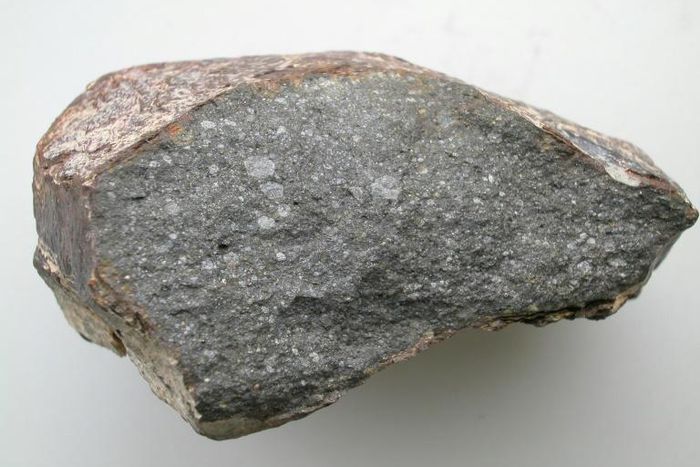 A piece of the meteorite Sahara 97096 (about 10 cm long), an enstatite chondrite