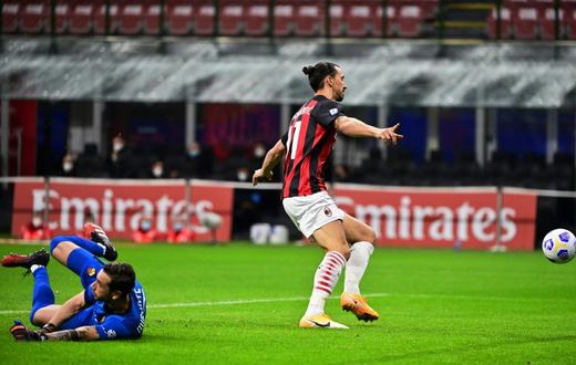 Double quick: AC Milan's Zlatan Ibrahimovic celebrated as the ball bounced into Antonio Mirante's net in the second minute