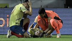 Colombia defender Santiago Arias (c) is expected to be sidelined for six months after breaking his leg in a 2022 World Cup qualifier against Venezuela