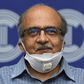 Prashant Bhushan smiles during a press conference in New Delhi after being fined a token one rupee (one US cent) for contempt of court
