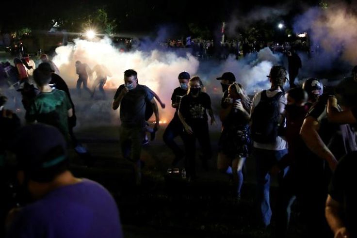 Police in the Wisconsin city of Kenosha used tear gas on August 25, 2020 in a bid to break up a demonstration sparked by the police shooting of Jacob Blake, a black man, as his three children watched