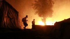 A local police source told AFP an operation to round up suspects had taken place on Monday on the roadside where thousands of asylum seekers have been sleeping since the camp burned down on September 8.