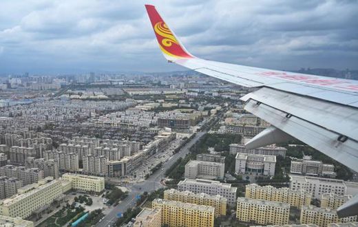 Urumqi in China's Xinjiang province has curtailed most flights into the city and shut down subway and public bus services after several coronavirus infections were detected