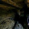 The last intact statue of Albania's communist dictator Enver Hoxha lies hidden under straw in a mountain village
