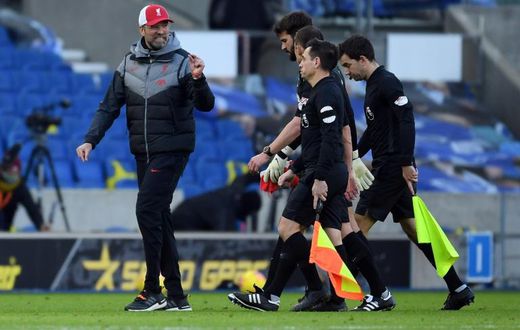 Liverpool boss Jurgen Klopp (left) was left frustrated by dropped points, VAR reviews and another injury after a 1-1 draw at Brighton