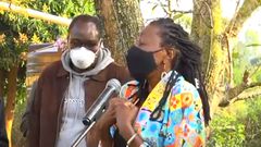 Actress, radio presenter Jacqueline Nyaminde "Wilbroda" addresses mourners during the burial of Charles Bukeko alias "Papa Shirandula"