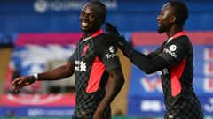 Liverpool forward Sadio Mane (left) celebrates scoring against Crystal Palace