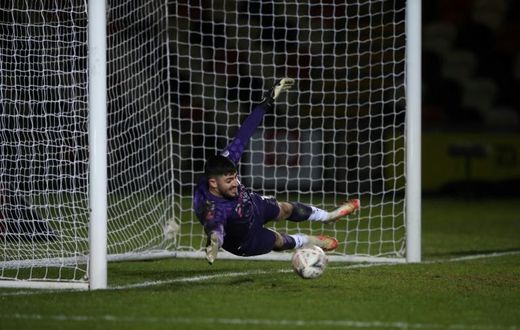 Newport County's goalkeeper Tom King in action