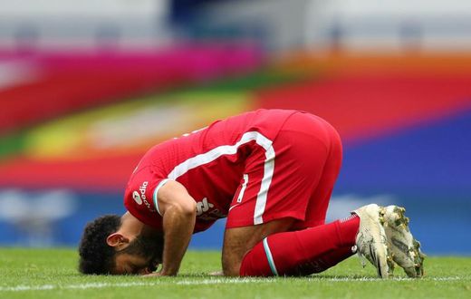 Egyptian Mohamed Salah celebrates his 100th Liverpool goal