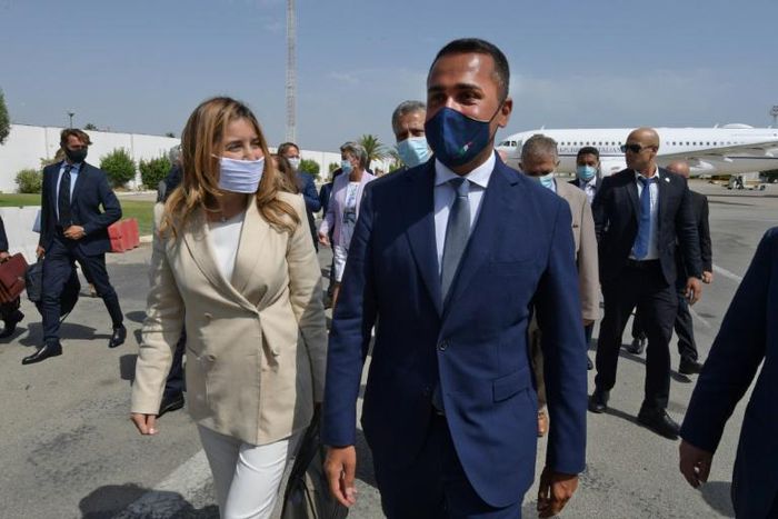 Italian Foreign Minister Luigi Di Maio (R) is welcomed on his arrival in Tunis by Tunisian Secretary of State for Foreign Affairs Salma Ennaiefer