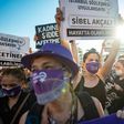 Demonstrators wearing protective face masks hold up placards during a demonstration for a better implementation of the Istanbul Convention and the Turkish Law 6284 for the protection of the family and prevention of violence against women, in Istanbul