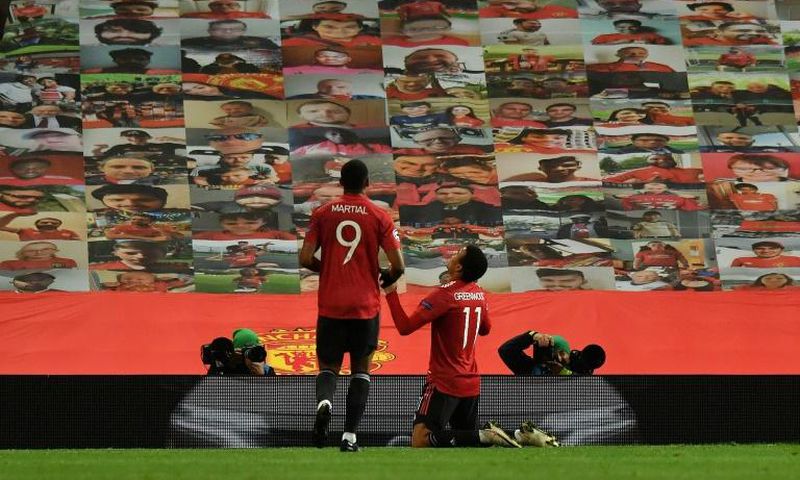 Manchester United's Mason Greenwood (right) celebrates his goal against Leipzig at Old Trafford