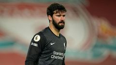 Cold feet: Alisson Becker made to mistakes leading to Manchester City goals in Liverpool's 4-1 defeat on Sunday