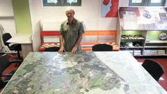 Willem van Gool, chairman of the tourism office for Baarle-Hertog and Baarle-Nassau, poses in Baarle, Belgium.