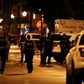 Fourteen people were wounded in the shootout outside a funeral parlor in Chicago