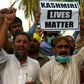 Protesters in Karachi shout slogans during a rally to show solidarity with people of Indian-administered Kashmir on August 5