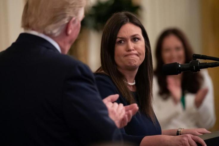 Sarah Sanders, then the White House press secretary, seen in June 2019 at the White House with President Donald Trump