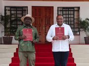 President Uhuru Kenyatta and Opposition Leader Raila Odinga receiving the final BBI Report