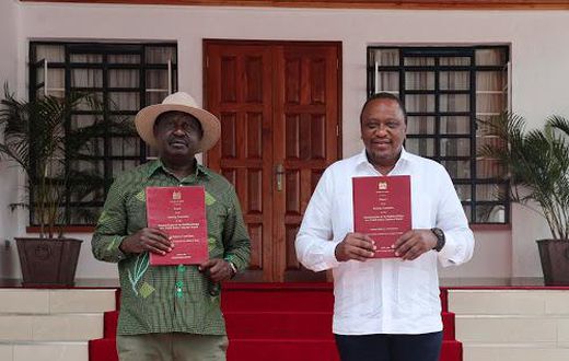 President Uhuru Kenyatta and Opposition Leader Raila Odinga receiving the final BBI Report