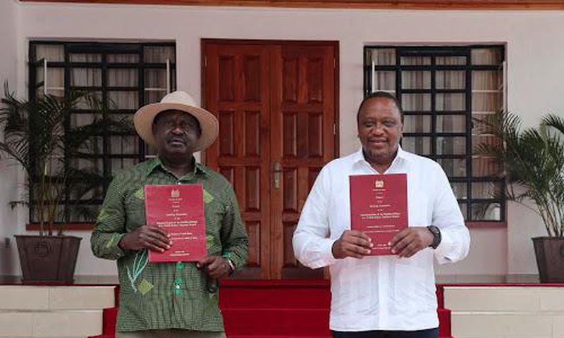 President Uhuru Kenyatta and Opposition Leader Raila Odinga receiving the final BBI Report