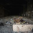 A lonely migrant from Syria on his journey towards Germany, rests in an abandoned railway tunnel in Belgrade