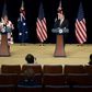 US Secretary of State Mike Pompeo listens while Australia's Foreign Minister Marise Payne speaks during a press conference