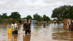 Dozens of residents in the capital Niamey fled their homes earlier on Thursday, wading or swimming through flooded streets