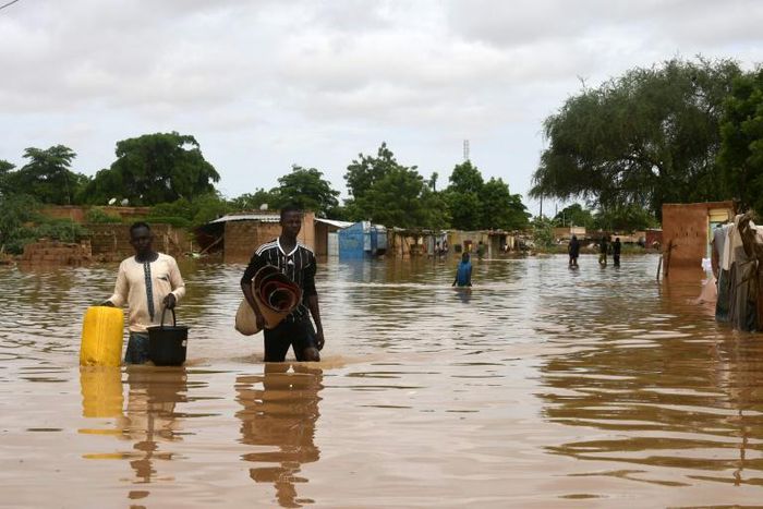 Dozens of residents in the capital Niamey fled their homes earlier on Thursday, wading or swimming through flooded streets