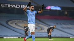 Algeria captain Riyad Mahrez celebrates completing his hat-trick for Manchester City against Burnley.
