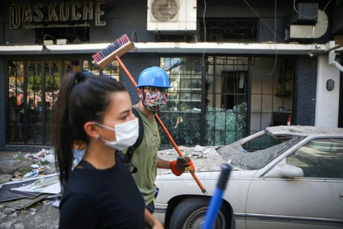 The day after a massive explosion at Beirut's port devastated the Lebanese capital's Mar Mikhail district, a spontaneous cleanup operation was underway