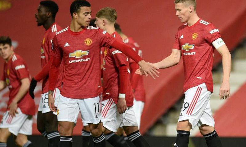 Manchester United midfielder Scott McTominay (right) celebrates after scoring against Watford in the FA Cup