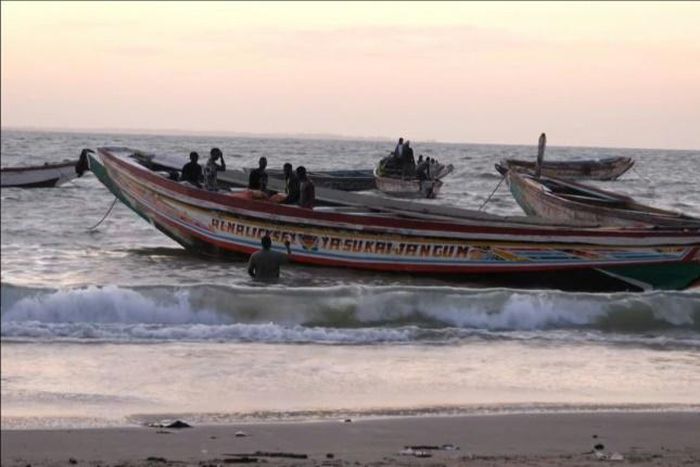 African migrants seeking to cross to the Canary Islands typically travel in small wooden boats like these. Smugglers' vessels are notoriously prone to engine failure and overloading.
