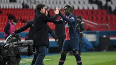 Pochettino celebrates his first win, 3-0 against Brest, with striker Moise Kean