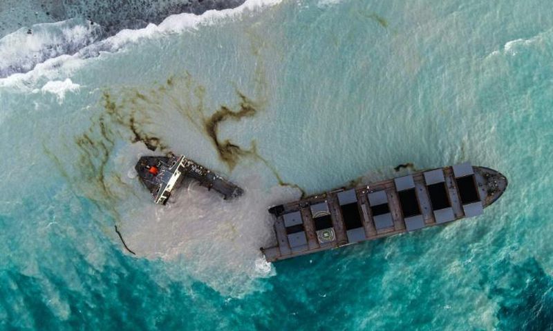 The split was caused by a crack in a cargo hold on the stern side, the ship's operator said