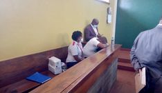 Former Nairobi Governor Mike Sonko accompanied by paramedics during court appearance on February 9, 2021