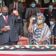 President Uhuru Kenyatta with First Lady Margaret Kenyatta after they received their Huduma Namba cads