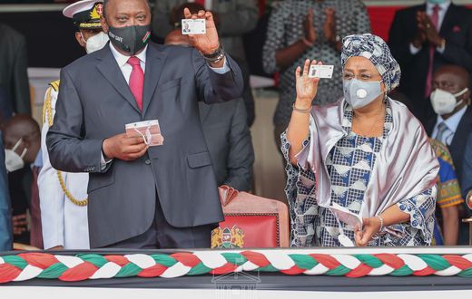 President Uhuru Kenyatta with First Lady Margaret Kenyatta after they received their Huduma Namba cads