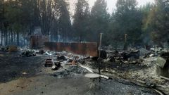 A burned out house is seen after the passing of the Holiday Farm fire in McKenzie Bridge, Oregon