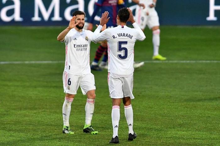 Real Madrid needed an unlikely double from Varane (R) to beat Huesca